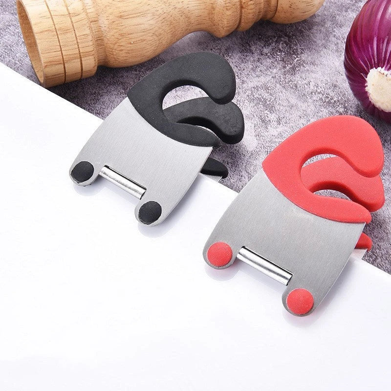 Premium stainless steel utensil holder with silicone lining and tilted design to prevent spills and keep cooking tools accessible