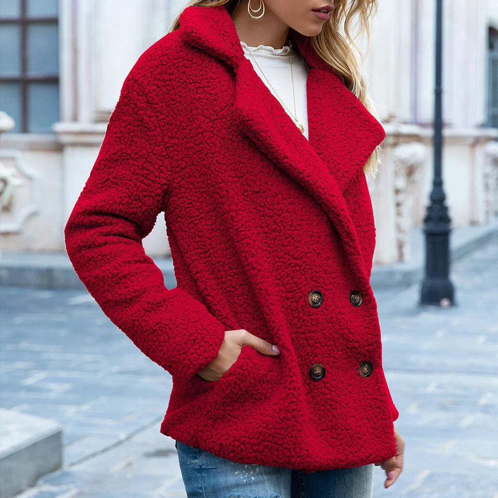 Cozy and stylish winter jacket for women, featuring a fluffy design, button closure, and a range of color options