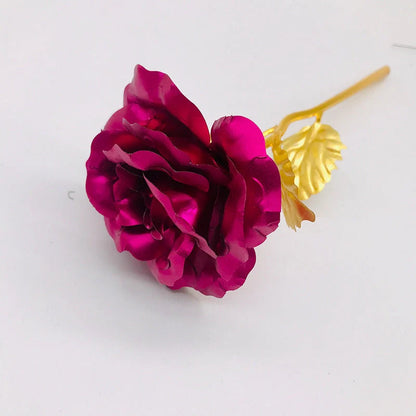 A luxurious 24K gold-plated rose flower bouquet set with a gift box and tote bag