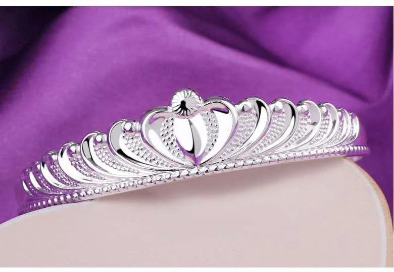 Women's silver electroplated crown bracelet with detailed design
