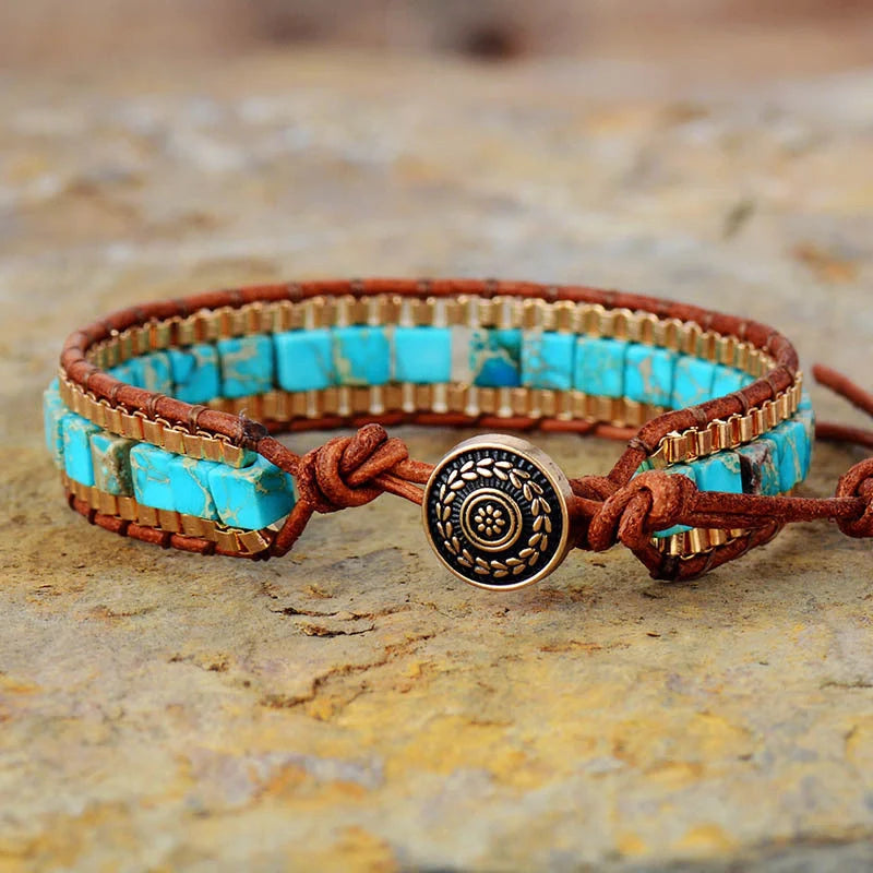 Hand-woven blue leather bracelet with imperial stone detail