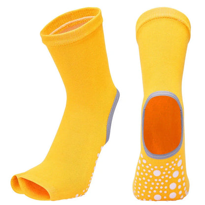 Premium non-slip yoga socks for women featuring split-toe design, jacquard knitting, and breathable combed cotton construction