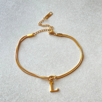 Personalised gold and silver love knot bracelets for couples, perfect as Valentine's Day gifts.