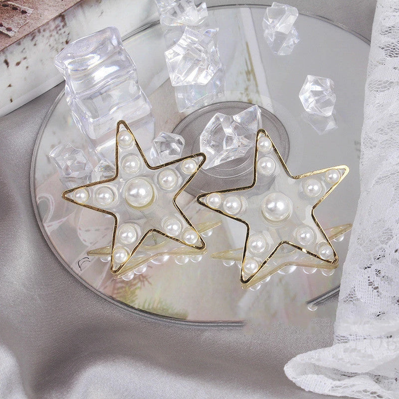 Charming peach heart and star stud earrings with elegant design and quality materials