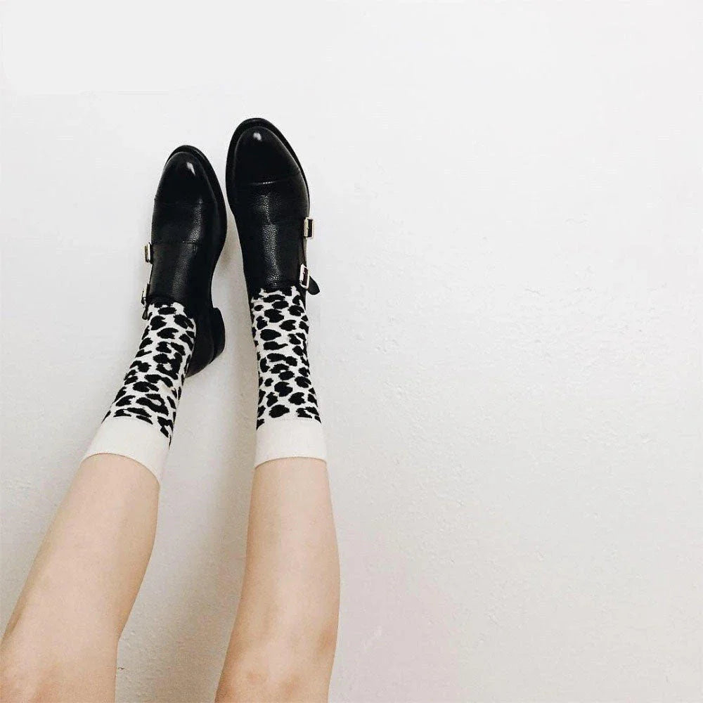 Stylish Dalmatian-inspired cotton crew socks with a premium blend of polyester, spandex, and cotton for all-day comfort and flexibility.