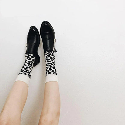 Stylish Dalmatian-inspired cotton crew socks with a premium blend of polyester, spandex, and cotton for all-day comfort and flexibility.