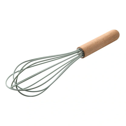 Silicone kitchenware set with wooden handles in various colors and styles, perfect for cooking, baking, and serving