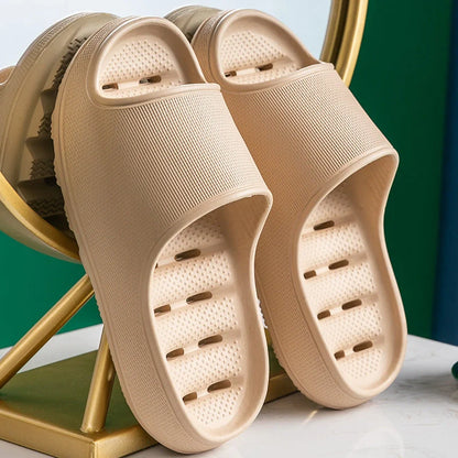 Thick-soled EVA slippers in various colours with non-slip sole and water leakage design