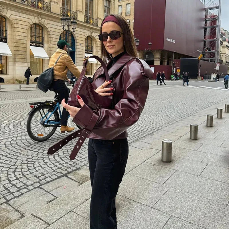 Stylish cropped leather jacket with loose lapel design, available in multiple trendy color options for fashionable streetwear