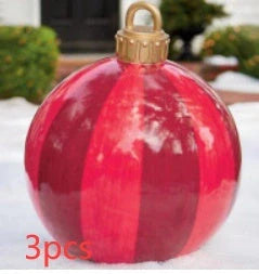 Vibrant inflatable Christmas baubles in a variety of colours and patterns, perfect for outdoor holiday decoration
