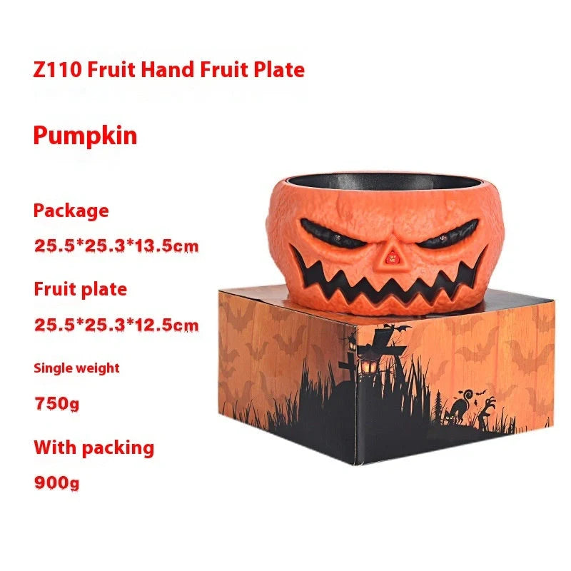 Motion-activated Halloween pumpkin candy bowl with spooky skeleton hand and glowing red eyes