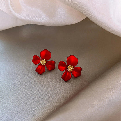 Elegant silver earrings with delicate red petal design inspired by Korean fashion