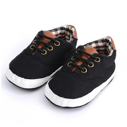 Solid colour baby canvas shoes with soft bottom and front strap in sizes 11cm to 13cm