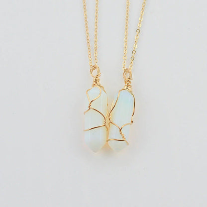 Elegant hexagonal quartz crystal necklace pendant on gold chain