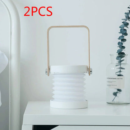 Elegant foldable LED lamp with touch-controlled dimming, rechargeable battery, and modern design for home decor