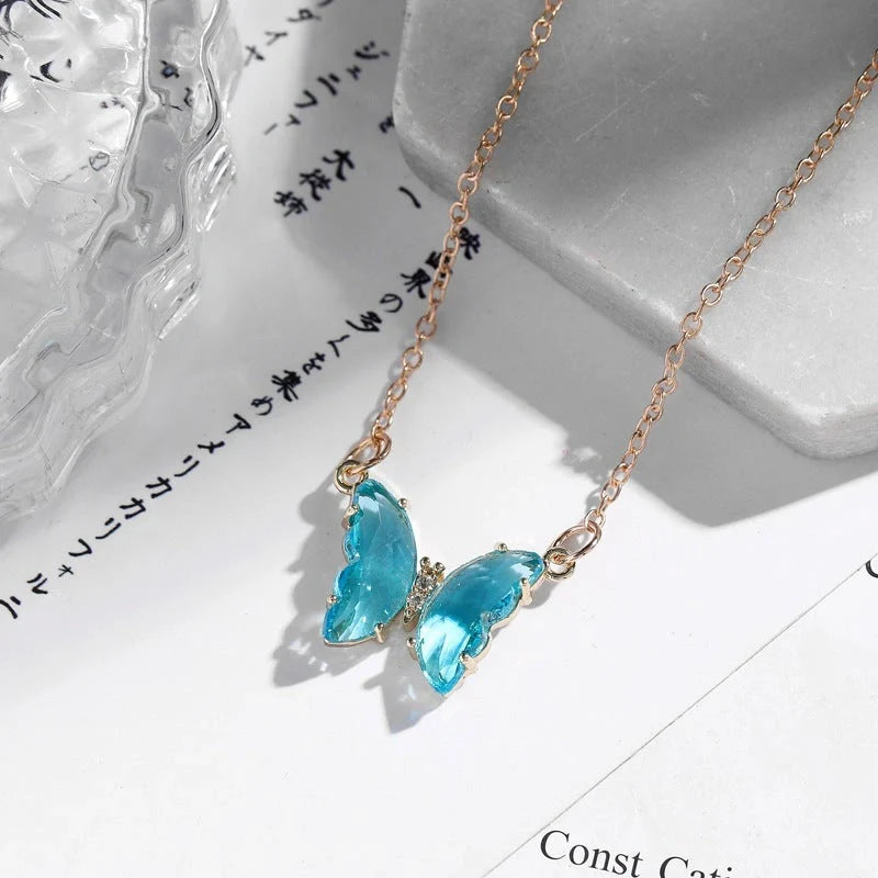 Girl Fantasy Glass Crystal Butterfly Necklace in blue, purple, light blue, and pink