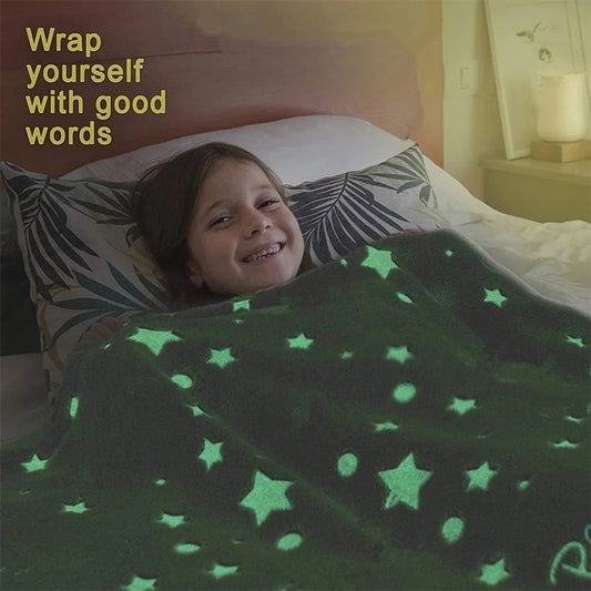 Glowing polyester wool blanket with stars and moons design, perfect for cosy nights