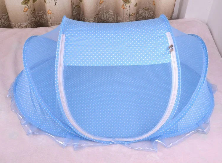 Foldable baby mosquito net bed with soft mattress and pillows, providing a safe and comfortable sleeping environment for infants and toddlers.