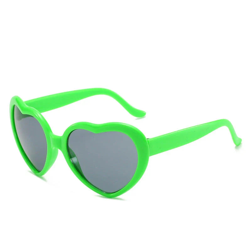 Stylish heart-shaped sunglasses with unique lens design that transforms light into enchanting special effects