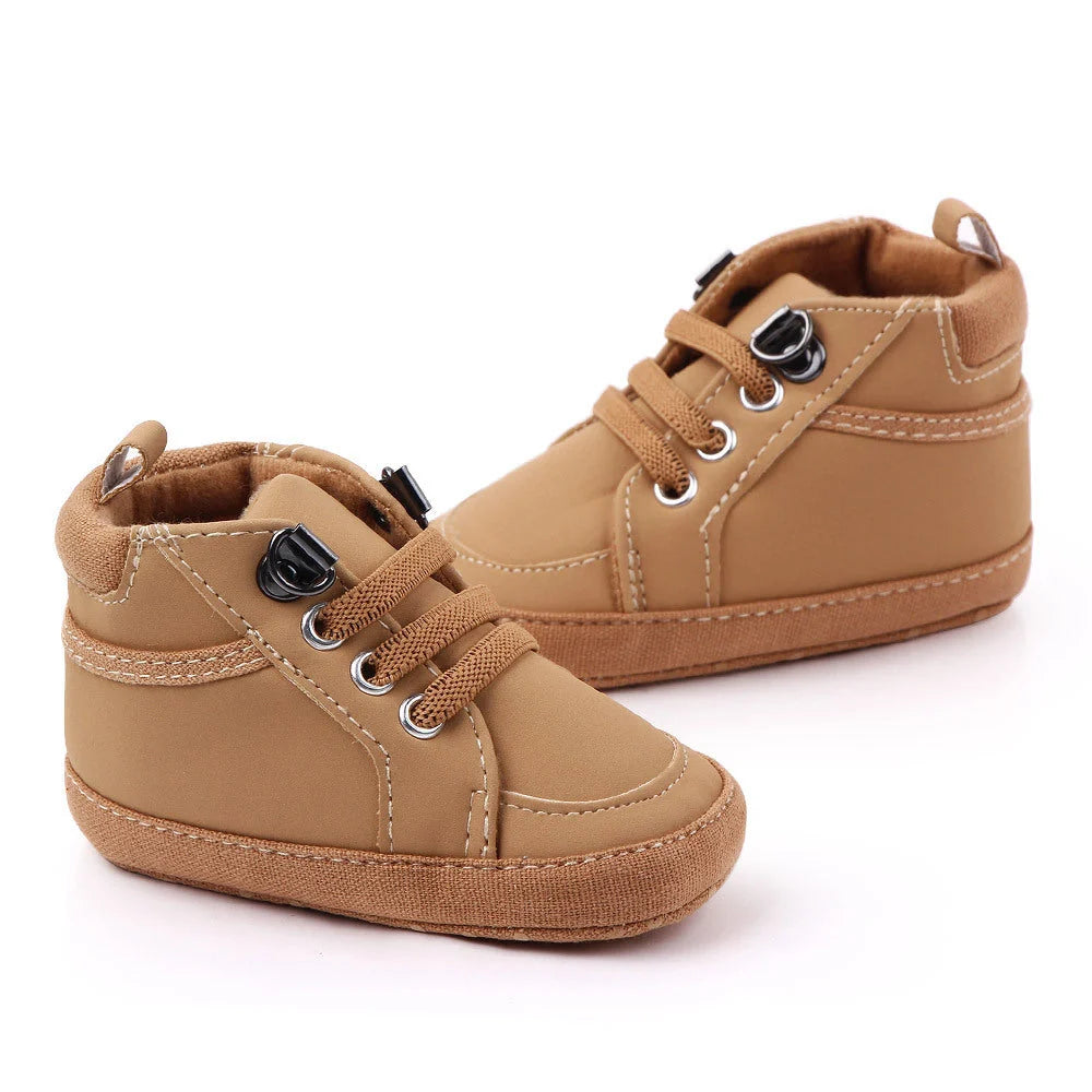 Soft-soled non-slip toddler shoes in brown, grey, and navy blue