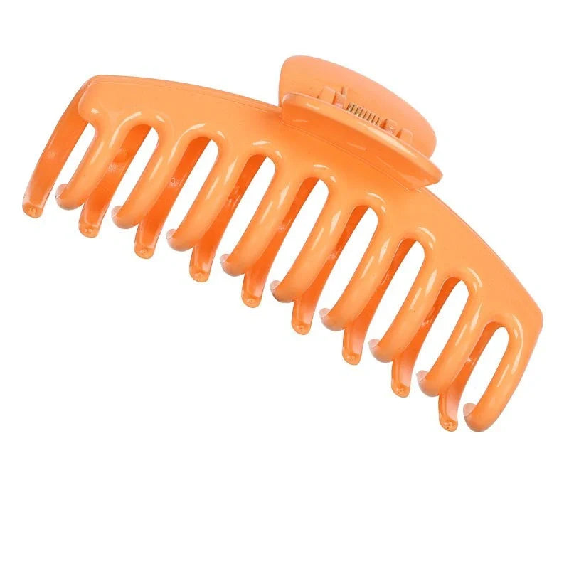 Candy-coloured plastic ponytail clip for showers and daily hair styling