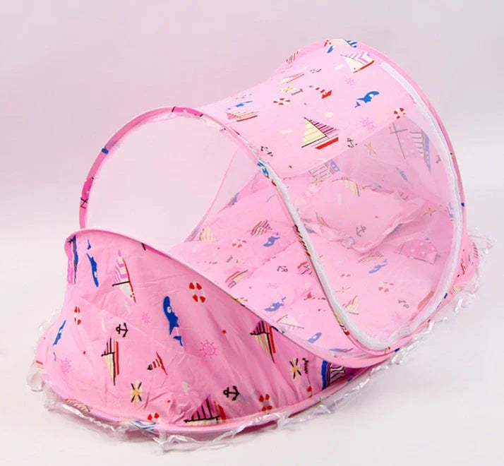 Foldable baby mosquito net bed with soft mattress and pillows, providing a safe and comfortable sleeping environment for infants and toddlers.