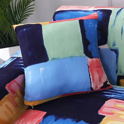 Stretchable geometric print sofa cover on a three-seater sofa
