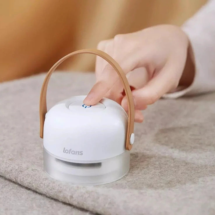 Rechargeable Hairball Removal Shaving Machine in white, compact and efficient for fabric care