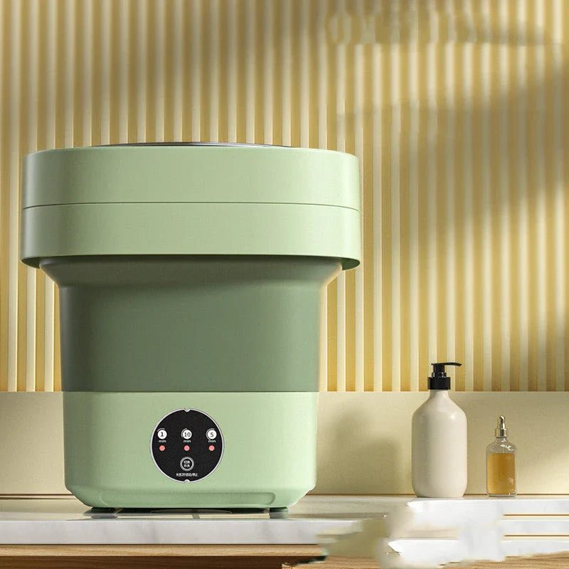 Compact folding washing machine for small spaces and travel, featuring a lightweight, portable design with powerful cleaning capabilities