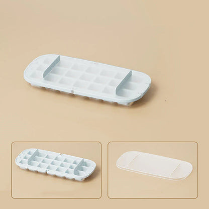 Versatile ice cube tray with high capacity, easy release, and dedicated storage compartment for included ice shovel