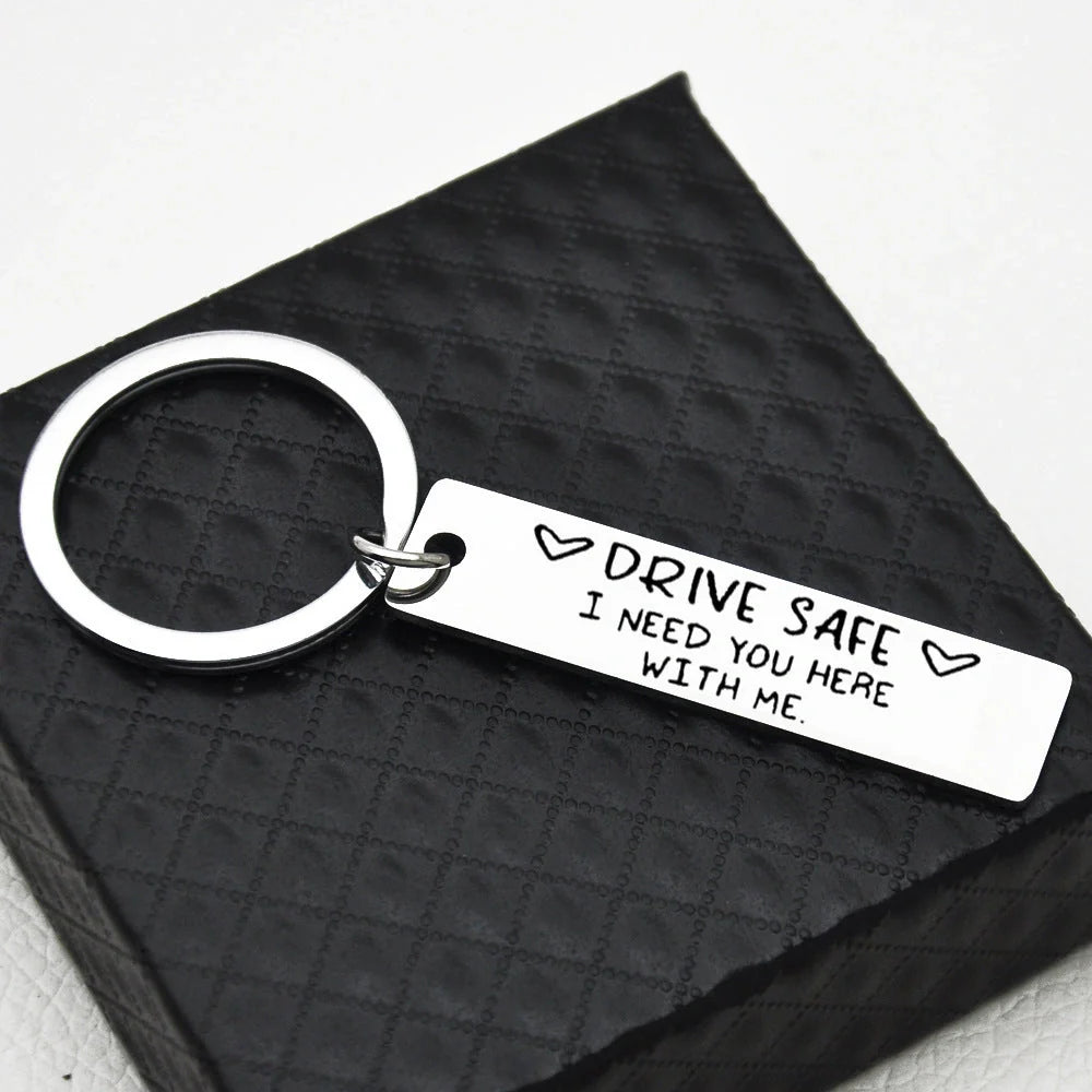 Stainless steel keychain with 'Be Safe Honey I Need You Here With Me' engraving
