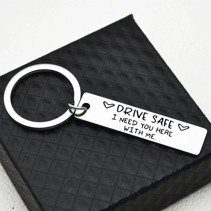 Stainless steel keychain with 'Be Safe Honey I Need You Here With Me' engraving