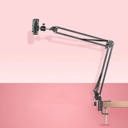 Versatile desktop phone and tablet holder with adjustable arm and 360-degree rotation for easy device positioning