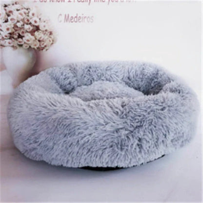 Cosy round plush cat mattress for winter warmth, available in various colours and sizes