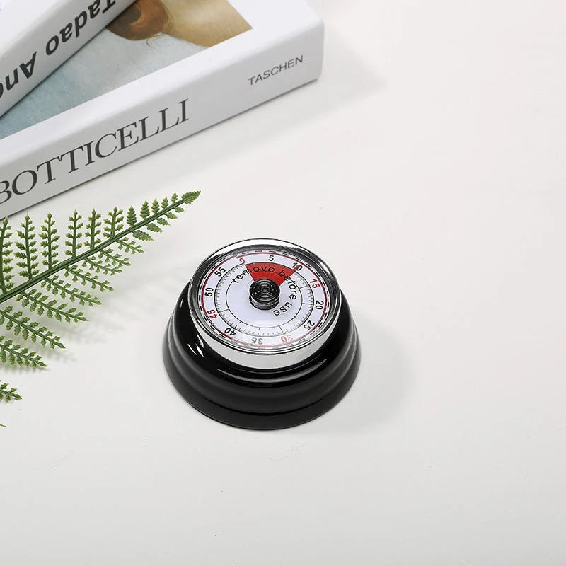 Stainless steel mechanical kitchen timer with magnetic back in black, red, or white