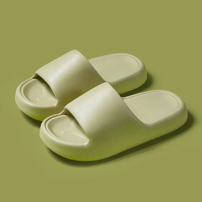 Comfortable EVA foam slip-on slippers in various colors, featuring non-slip soles and a breathable design for indoor and bathroom use.