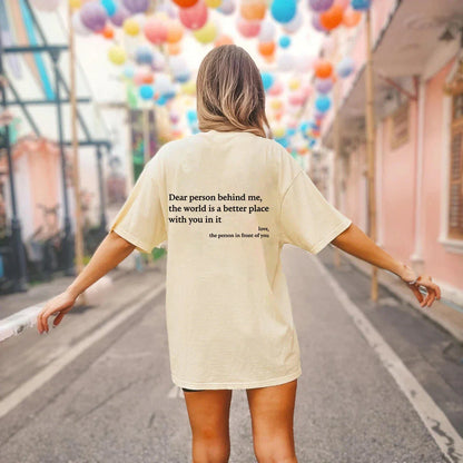 Women's graphic tee with playful slogan, available in various colors and sizes