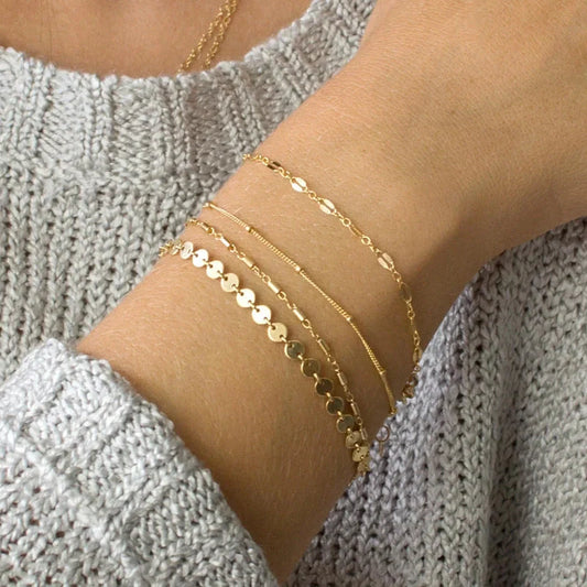 4-pack set of electroplated tube chain disc lace bracelets in gold and silver
