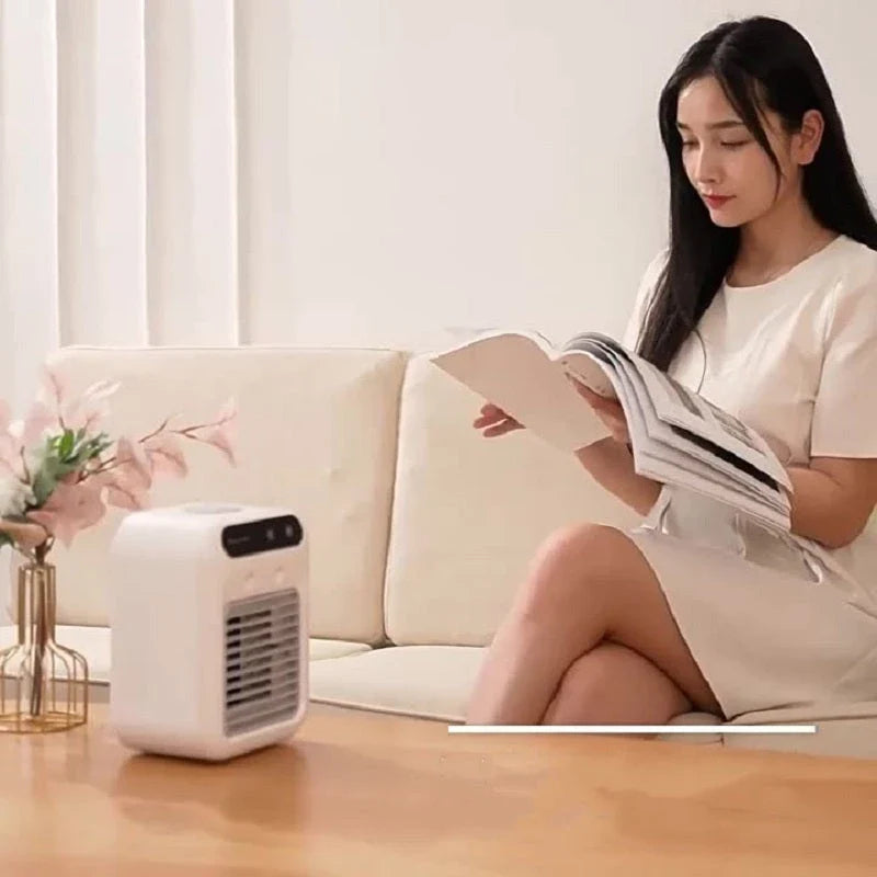 Portable USB-powered air cooler with humidifying function, ideal for home, office, and car use