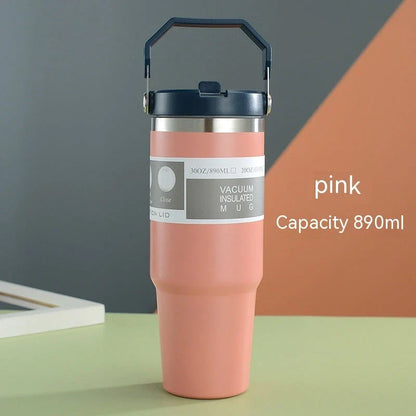 Stainless steel insulated tumbler with handle, available in multiple colors and sizes, designed to keep drinks hot or cold for hours.