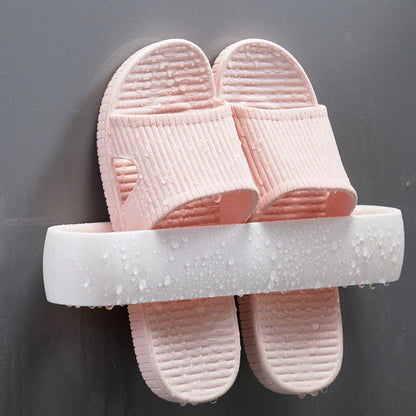 Premium bathroom slippers with suction cups for secure hold, available in pink, blue, and grey colours
