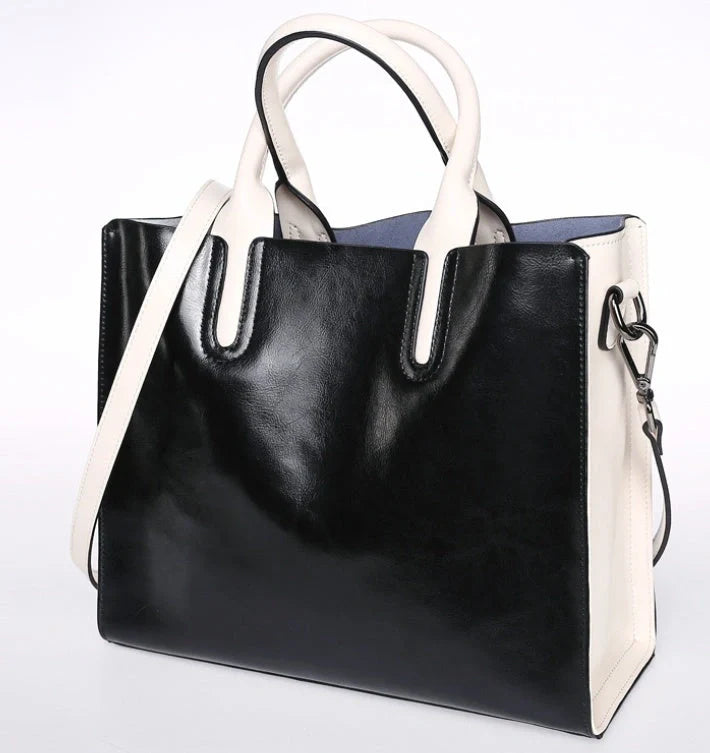 Sofia Spanish Trunk Tote in various colours with multiple compartments and zipper opening