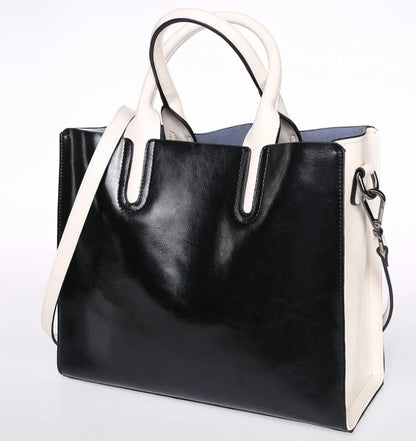 Sofia Spanish Trunk Tote in various colours with multiple compartments and zipper opening