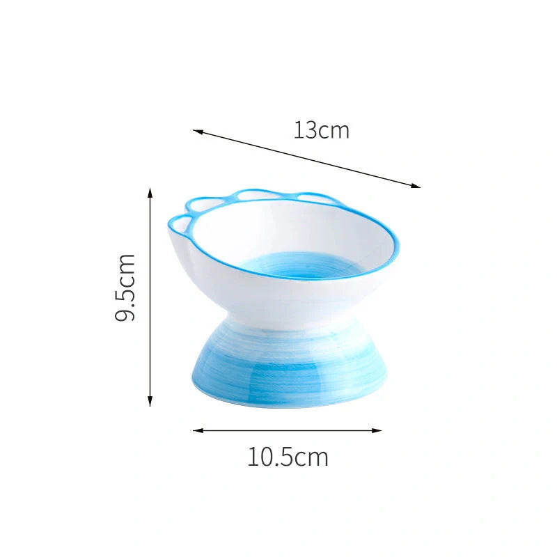Ceramic pet bowl with 15-degree incline design in pink, green, and blue