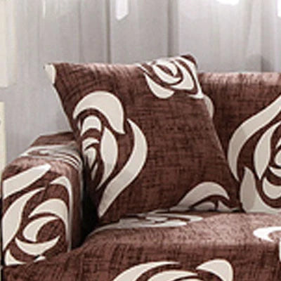 Stretchable geometric print sofa cover on a three-seater sofa