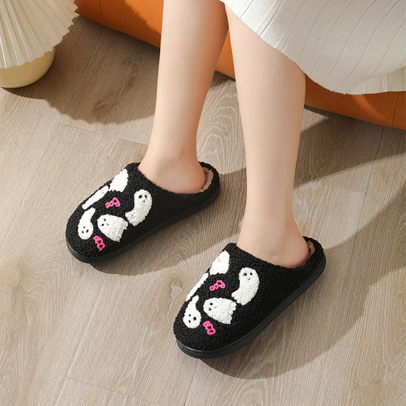Cozy Halloween-themed cartoon ghost slippers with soft cotton construction and non-slip soles for comfortable indoor wear