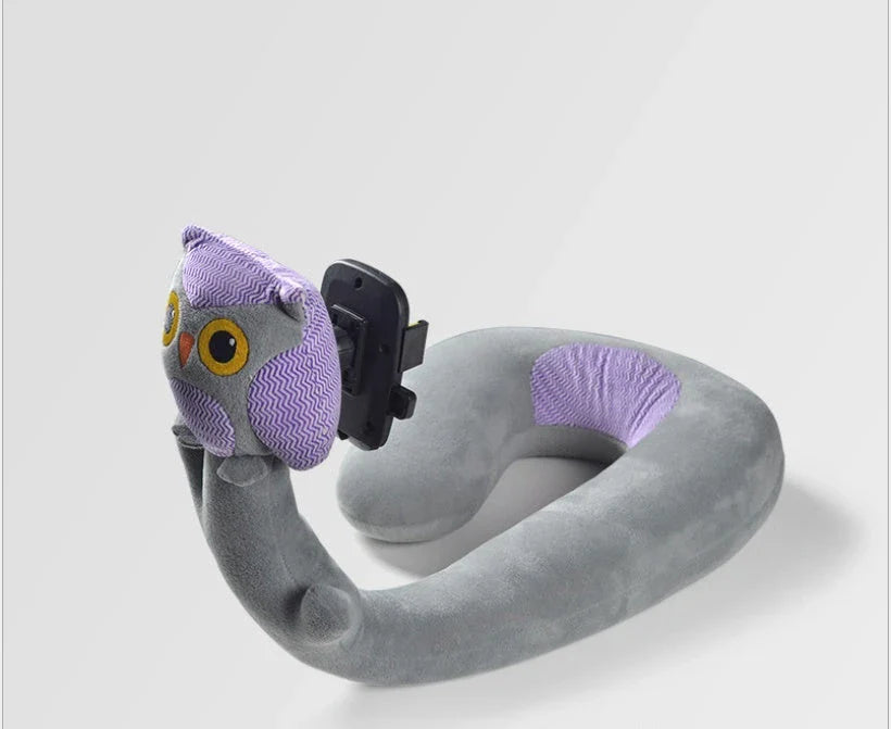 Cozy U-Shaped Pillow with Built-In Phone Holder in various colors, including Red Flamingo, Pink Unicorn, Orange Giraffe, Gray Snake, and Lagoon Dinosaur