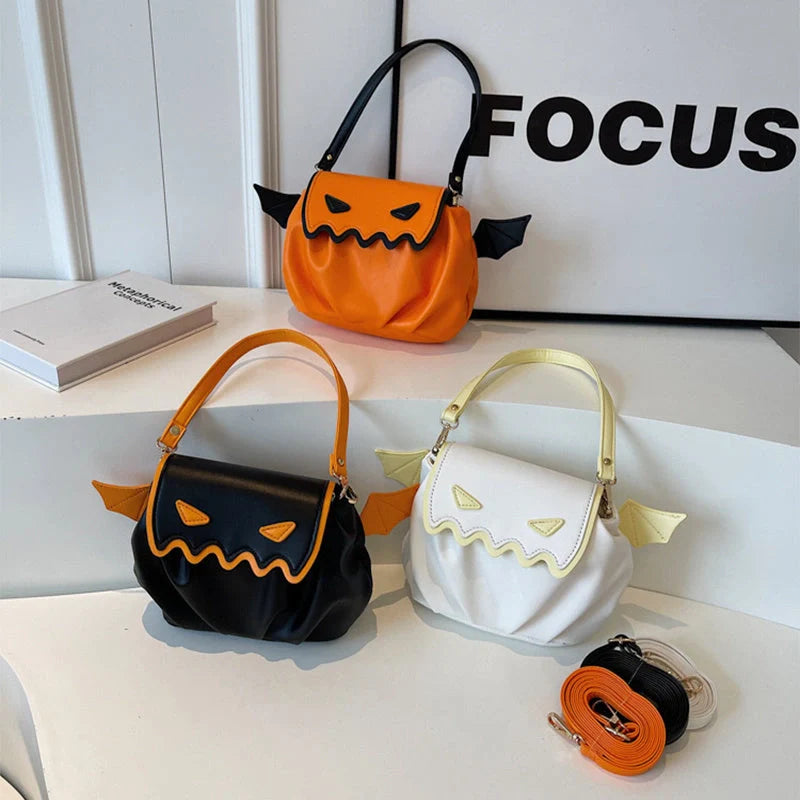 Halloween pumpkin cartoon crossbody bag with small wings in black, beige, or orange