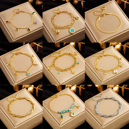 Gold plated punk fashion bracelet with double layer snake chain design and five-pointed star charm