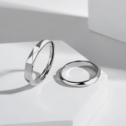 Stylish sterling silver rings with a hidden love pattern design, perfect for romantic gifts or personal accessorizing.